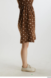 Aera  1 brown dots dress casual dressed flexing leg…
